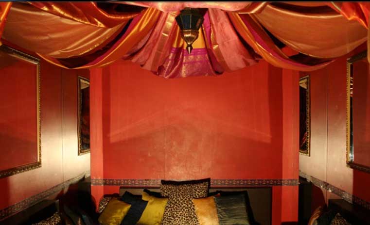 Maxine's Gentleman's Club red room bed